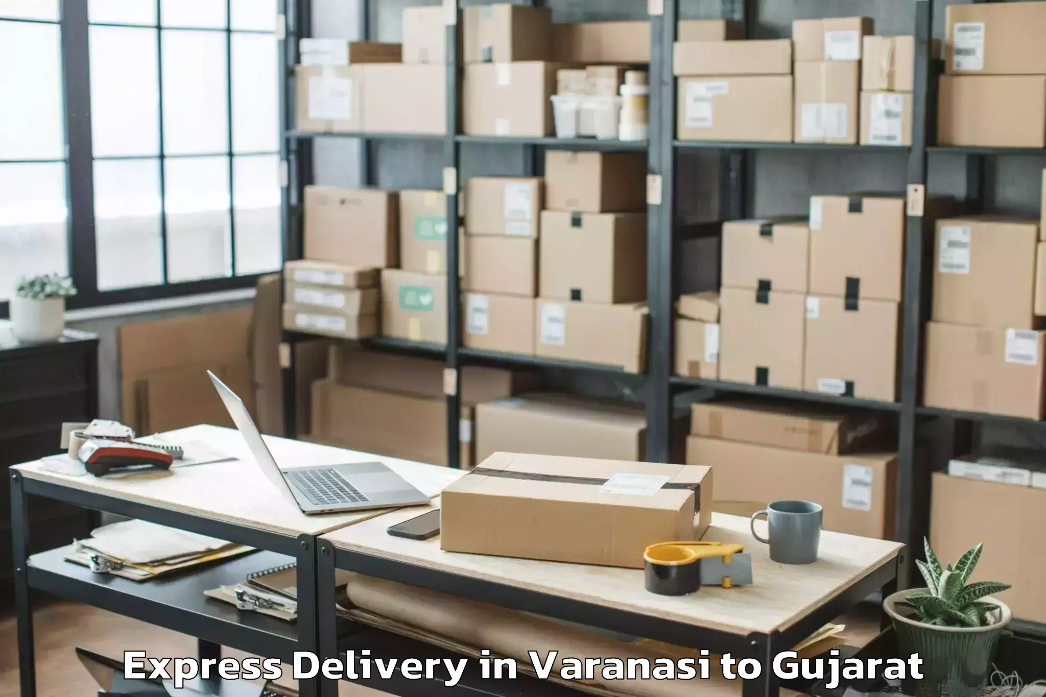 Book Varanasi to Kamrej Express Delivery